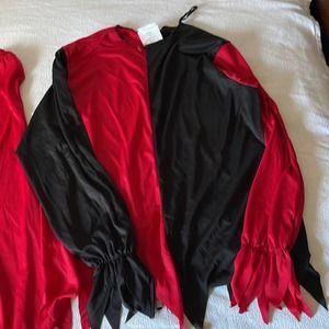 Brand new EVIL JESTER Adult medium Halloween costumes.